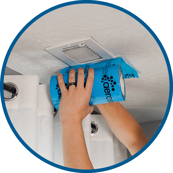 Step 1: Prep the ductwork - technician sealing registers